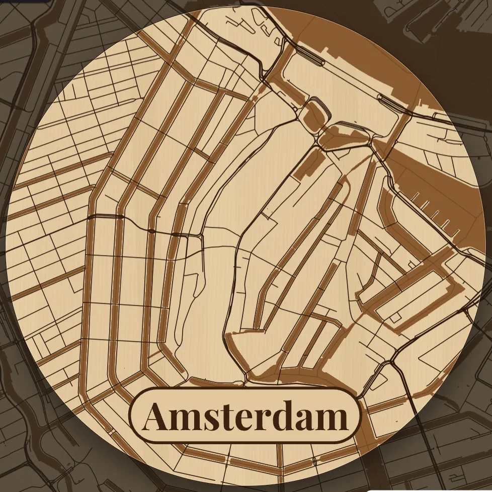 A round map of Amsterdam for a 100 mm coaster, engraved on plywood, with the city name in a pill-shaped badge